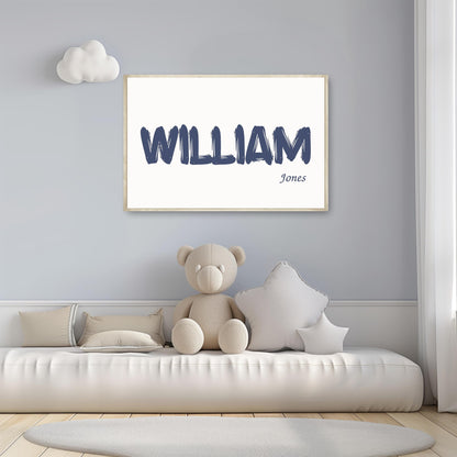 Personalized baby name sign with the name William Jones in blue brush font, displayed on a nursery wall above a cozy setup with stuffed animals.