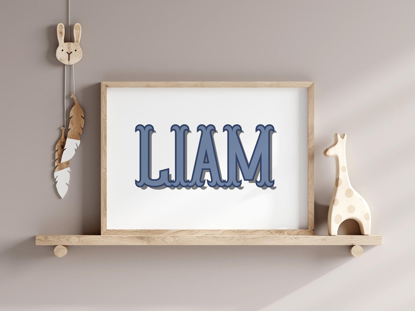 Blue custom name sign on a shelf with nursery decorations, perfect as a unique nursery decor piece or a thoughtful baby gift.