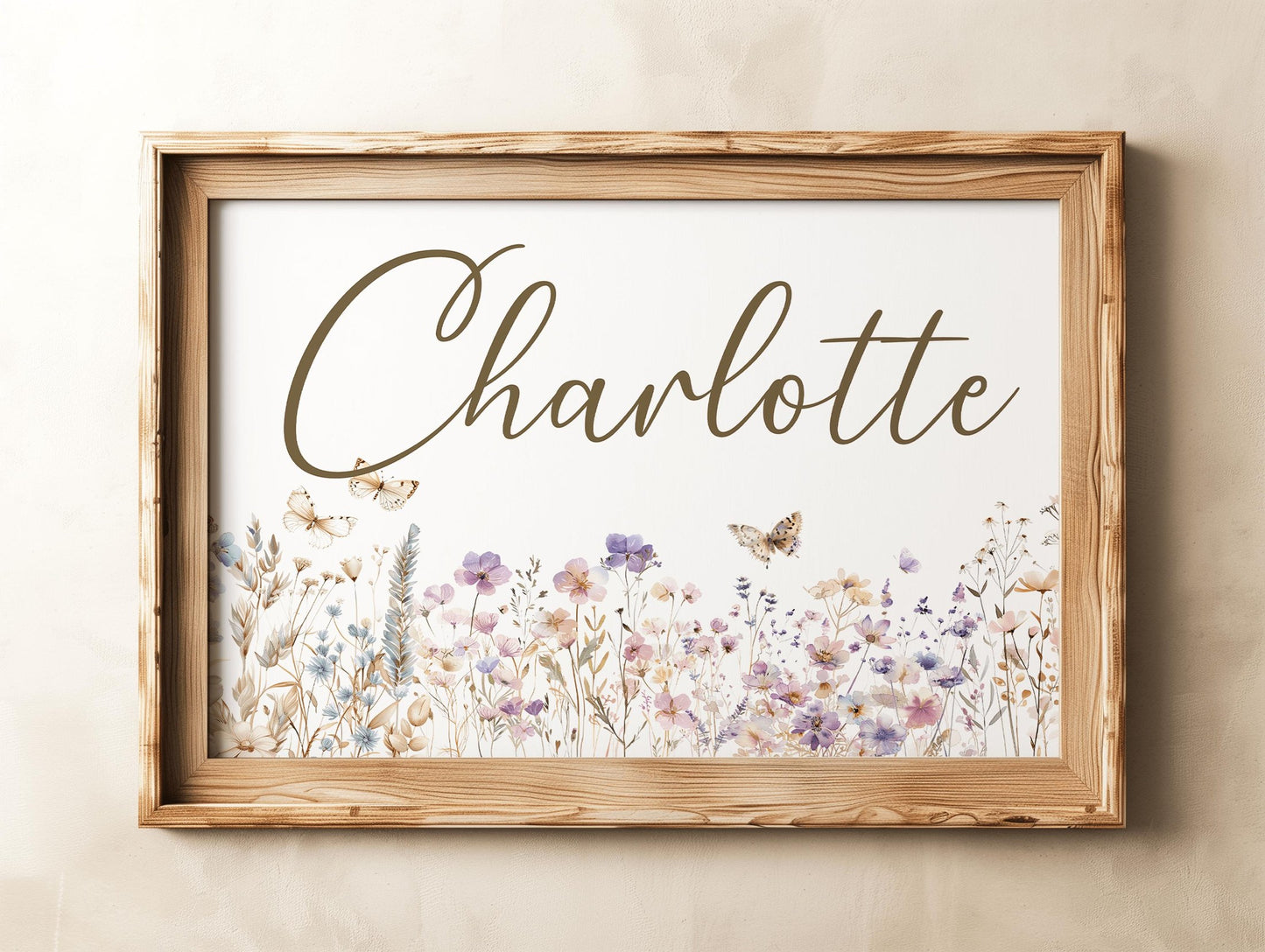 Wooden-framed floral name sign featuring delicate wildflower details, ideal for personalized nursery name sign or baby gift.