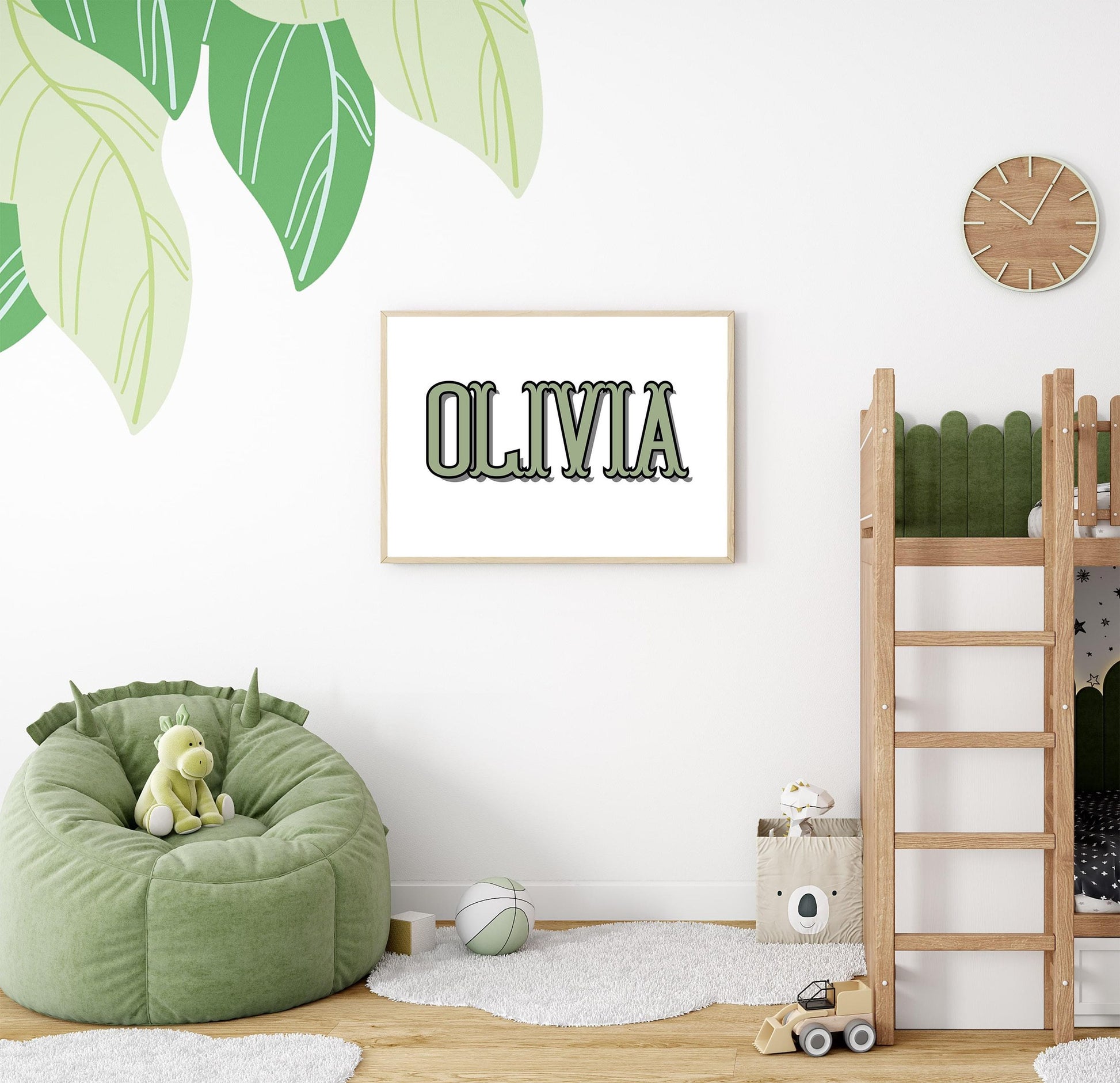 Personalized green name sign in a nursery with natural green decor, a custom touch to nursery decor, ideal as a baby shower gift.