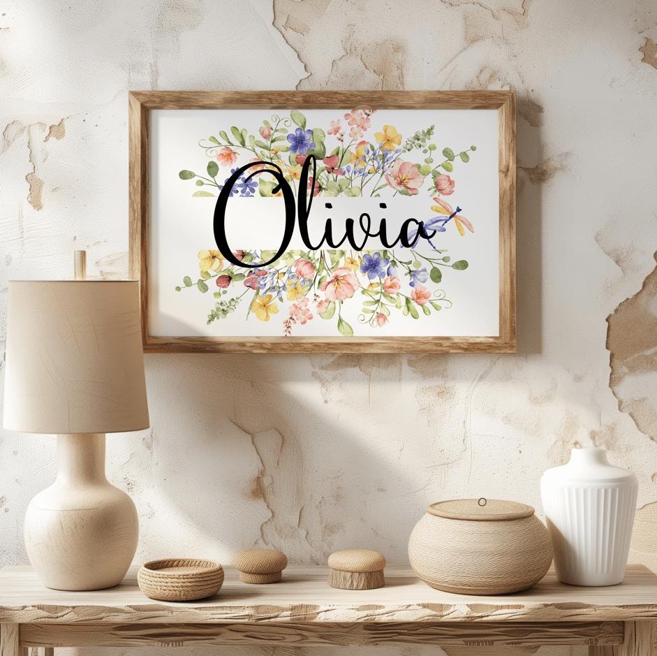 A rustic nursery featuring a wildflower name sign framed in wood, showcasing vibrant floral patterns and personalized typography. Perfect for custom nursery decor and baby shower gifts.