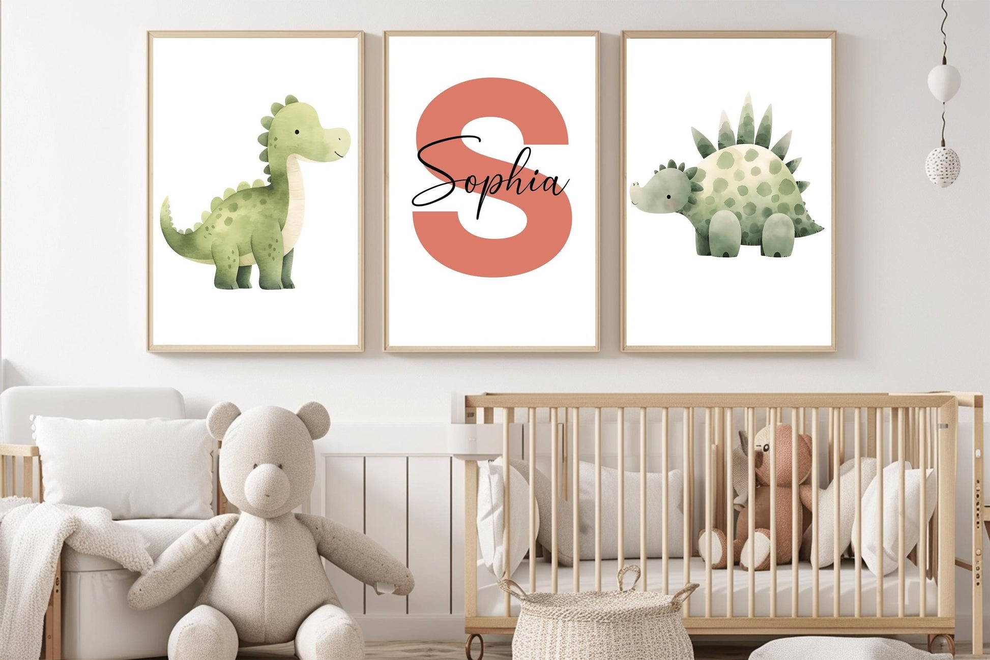 Dinosaur nursery print set featuring adorable green dinosaurs and a personalized name initial. A thoughtful gift for baby showers or boys&#39; nursery decor.