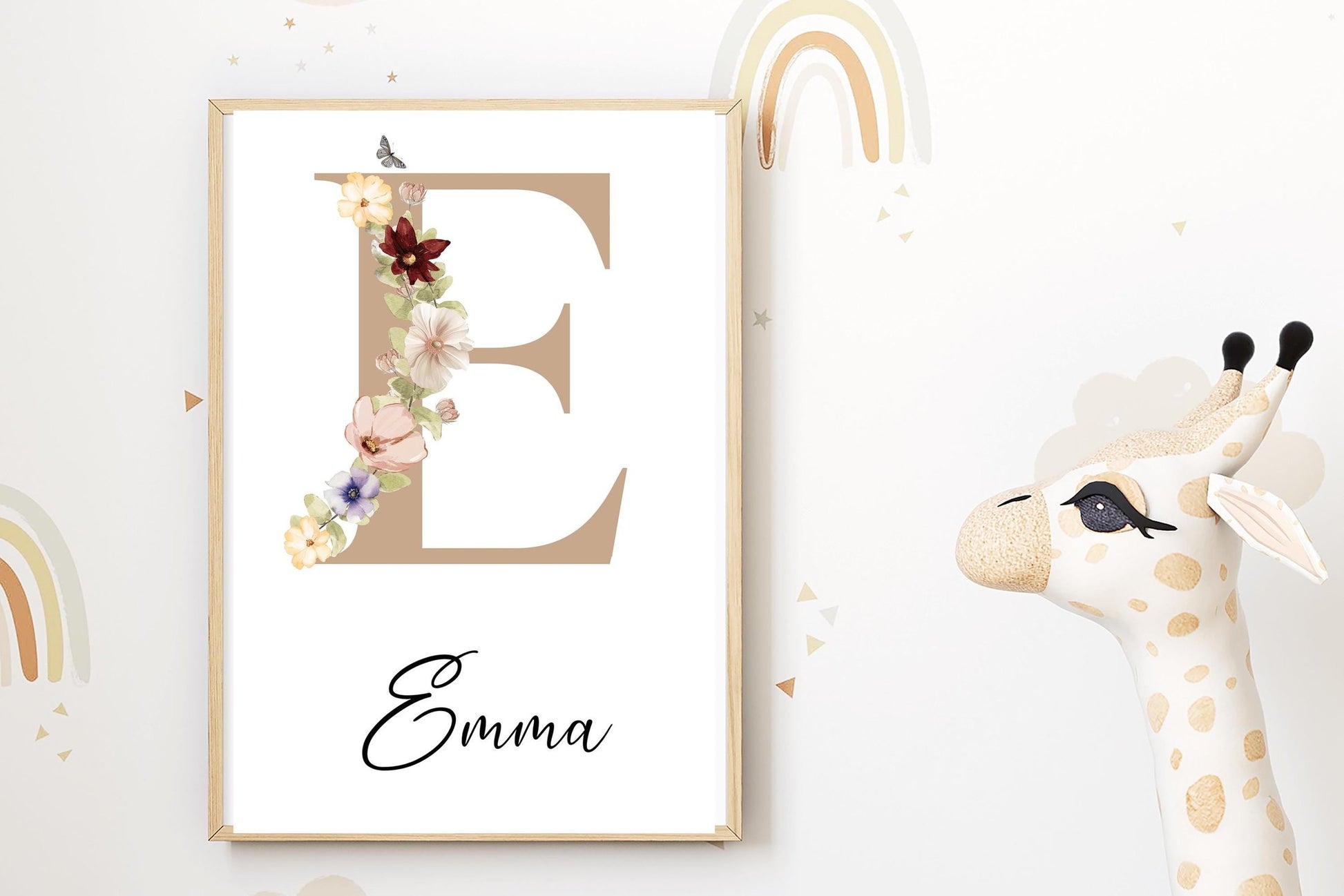 Sophisticated name sign featuring a beige initial surrounded by floral designs, perfect for wildflower nursery decor or a new baby gift.