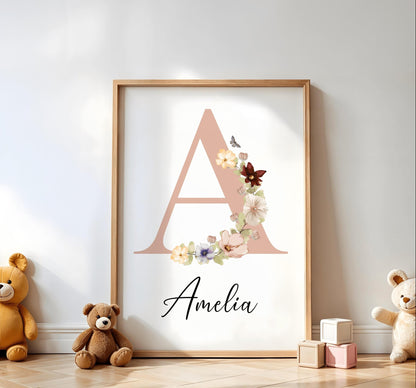 Personalized baby name sign with a peach initial decorated with delicate flowers and butterflies, a stylish addition to custom nursery decor.