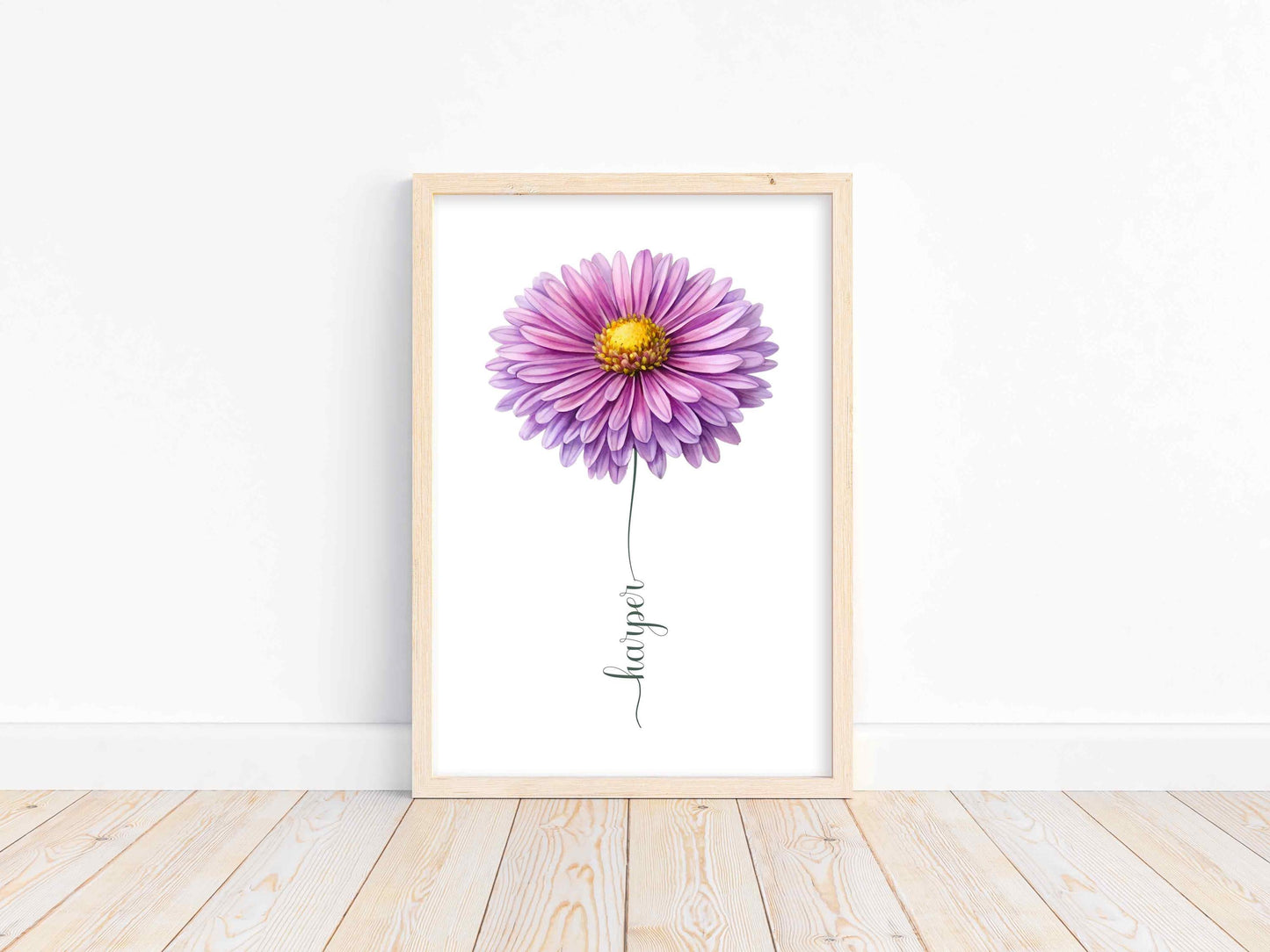 A purple daisy flower print in a sleek white frame, adding charm and personality to walls with a custom flower name sign.