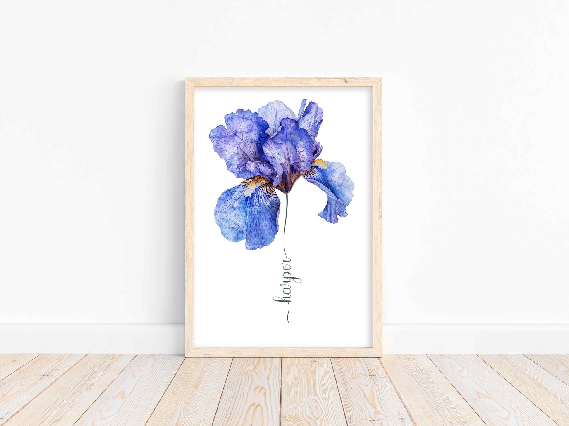 Minimalist white wall with a framed blue iris flower artwork personalized with the name Diana ideal for elegant modern home decor.